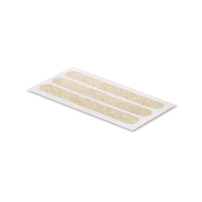 Wundnahtstreifen auf Trägerfolie, drei beige Pflasterstreifen