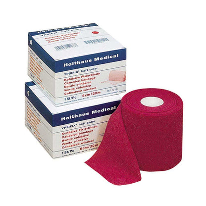 Pinkfarbene Haft-Fixierbinde YPSIFIX® als Rolle, sichtbar das Band innen
